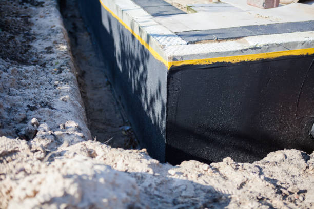 Professional Interior Drainage System technician working in Carrollton, MI